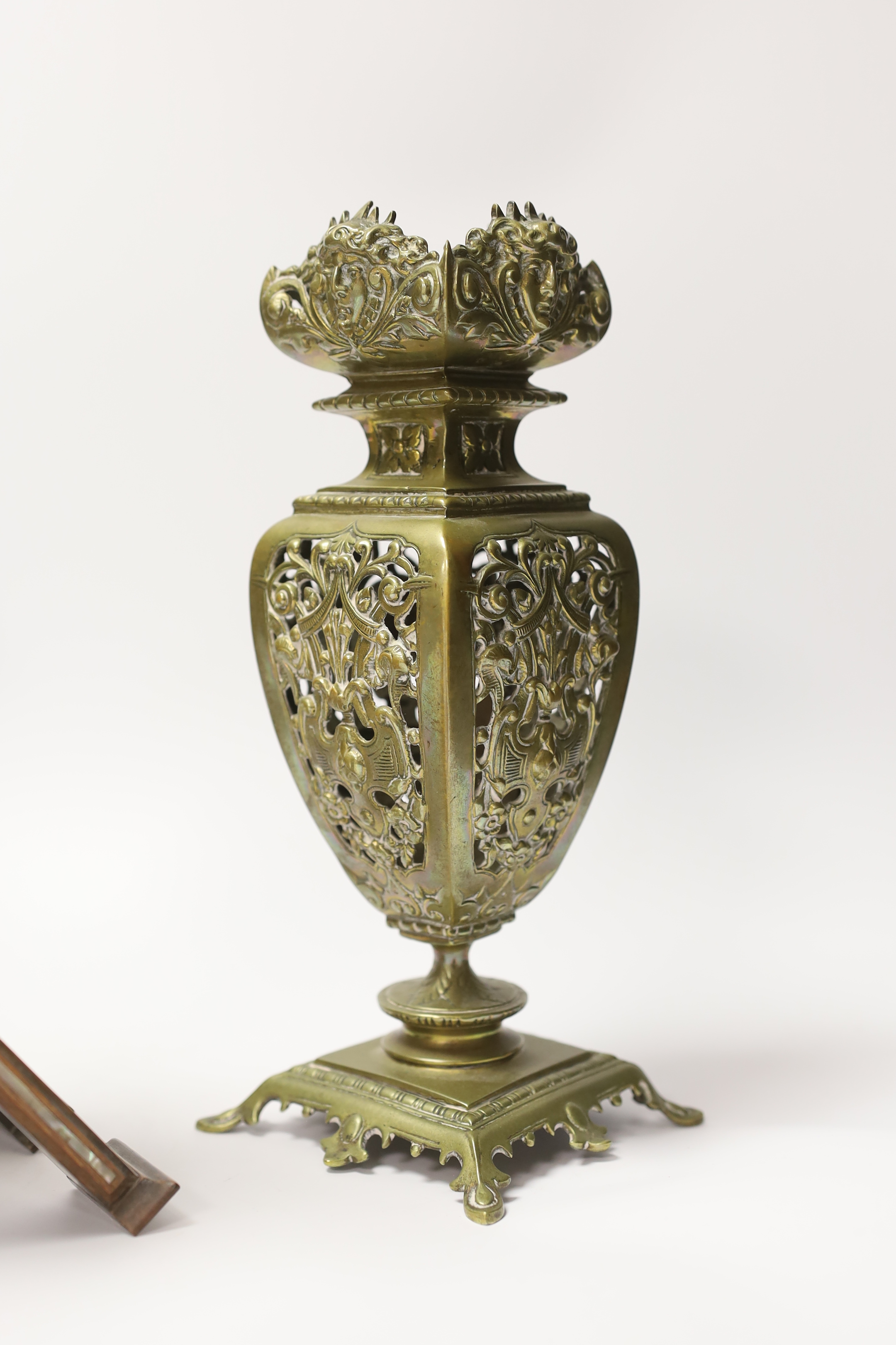 A pair of early 20th century brass garnitures, a German brass tachometer and a mother of pearl inlaid Quran stand, tallest 25cm